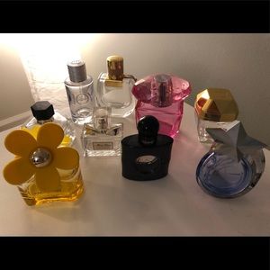 8 empty perfume bottles